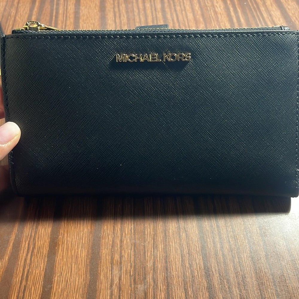 Brand new Michael Kors black wallet